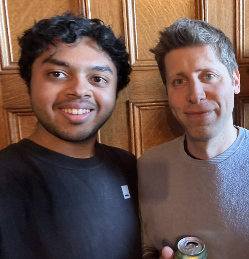 Sam Altman speaking at an event.